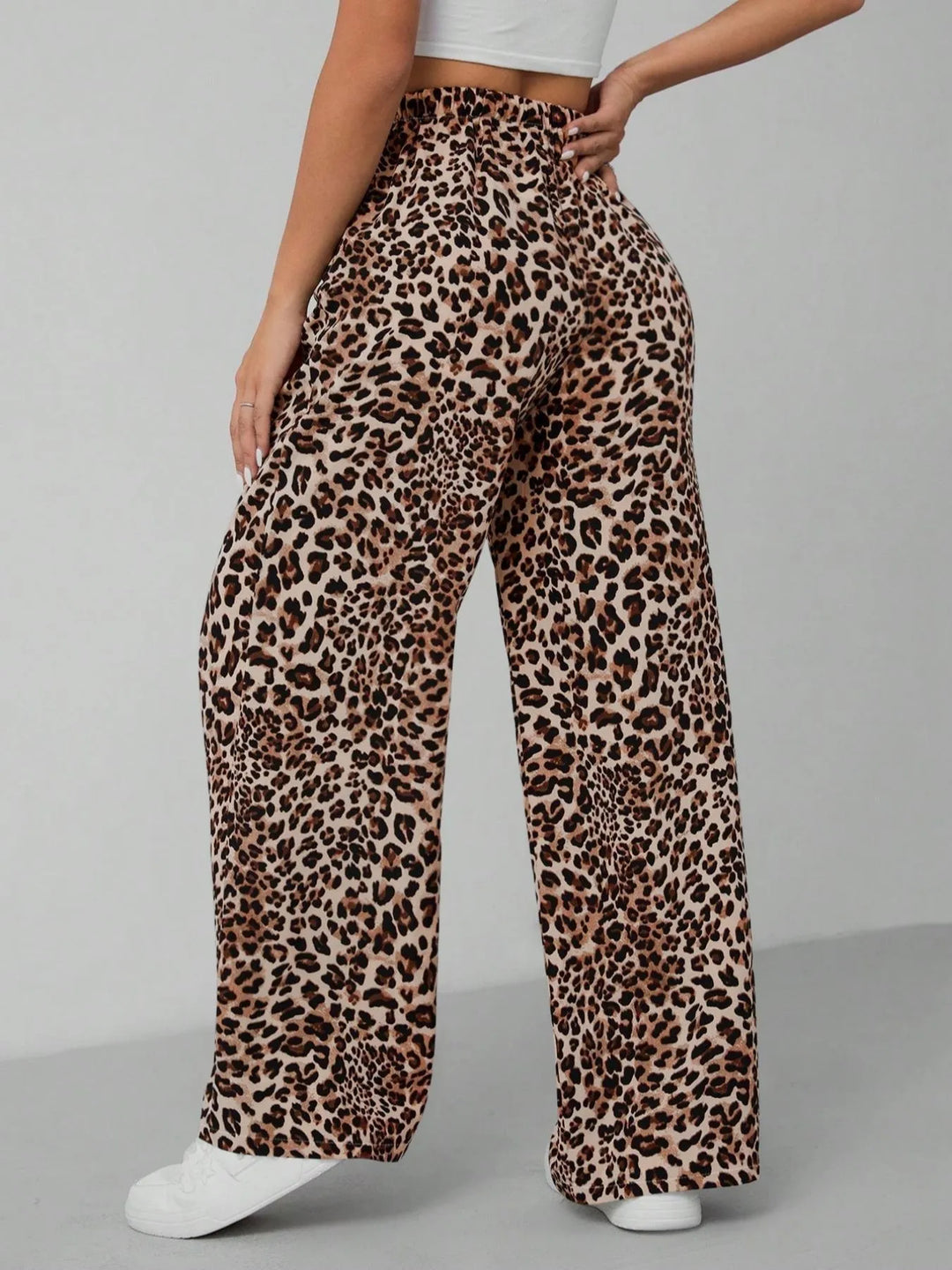 Casual and trendy leopard print wide leg pants for women, offering a fashionable statement look.