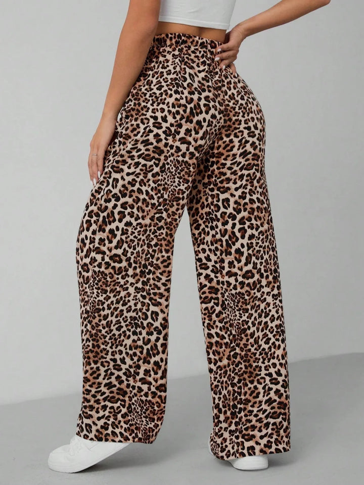 Casual and trendy leopard print wide leg pants for women, offering a fashionable statement look.