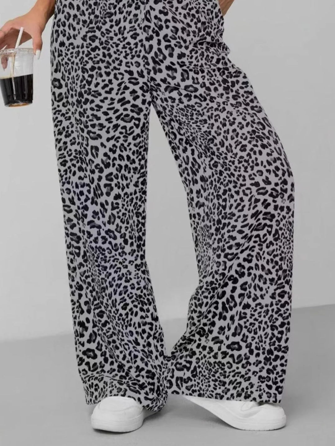 Stylish women's leopard print wide leg pants with a flattering relaxed fit and drawstring waist.