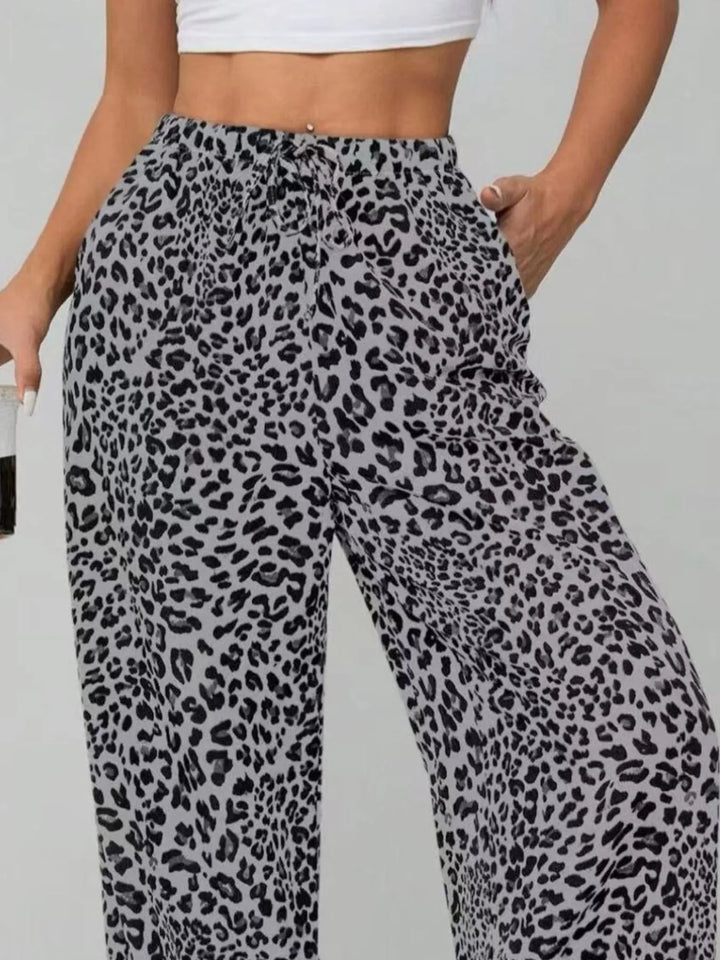 Versatile leopard print wide leg pants for women, ideal for a chic and casual summer wardrobe.