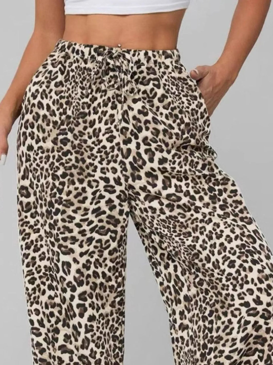 Fashion-forward women's leopard print wide leg pants, a must-have for a statement casual style.