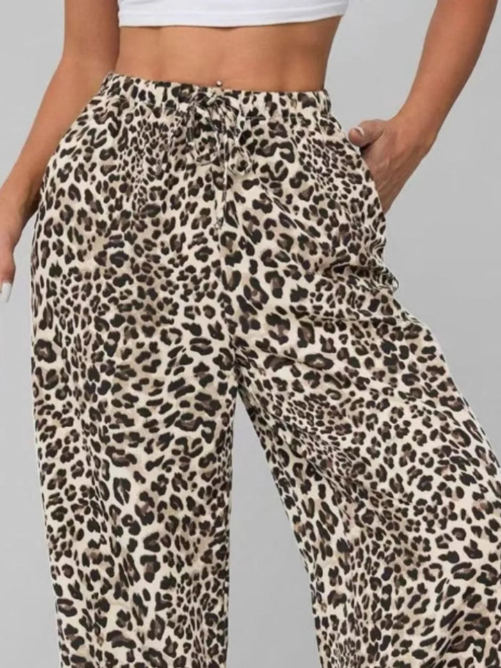 Fashion-forward women's leopard print wide leg pants, a must-have for a statement casual style.