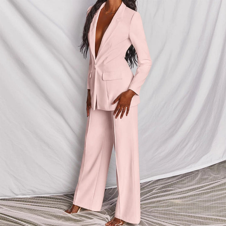 Formal women's office wear: a sleek tailored blazer & classic trousers suit ensemble.