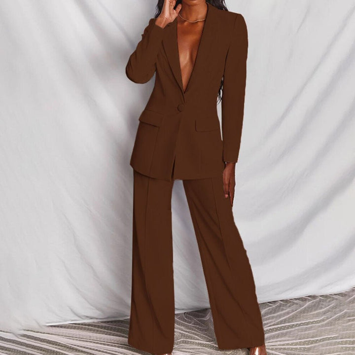 Professional women's chic tailored blazer and trousers suit, perfect for a smart office look.