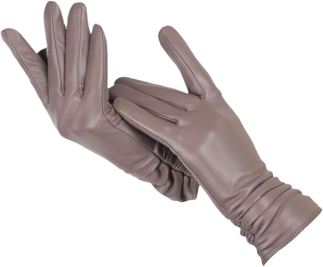 Hand showcasing the premium quality and fit of Nicole women's leather gloves.