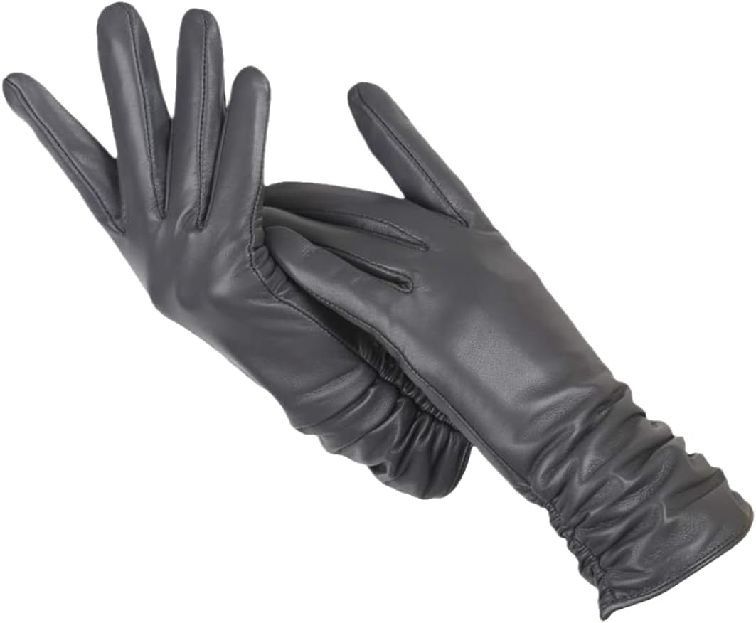 Model wearing chic brown leather gloves, highlighting their fashionable design.