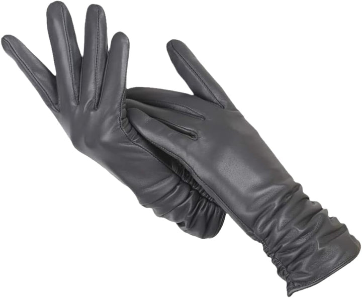 Model wearing chic brown leather gloves, highlighting their fashionable design.