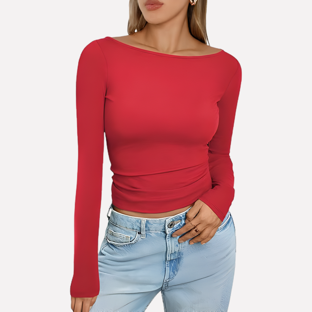 Versatile women's long sleeve boat neck top, a wardrobe staple for casual and everyday outfits. Fitted design.