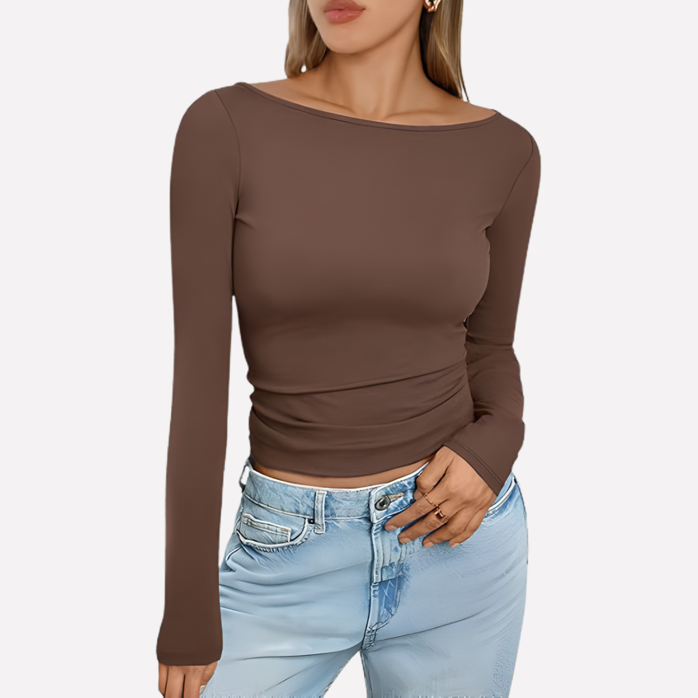 Comfortable women's long sleeve boat neck top, perfect for casual outings & everyday elegance. Fitted silhouette.
