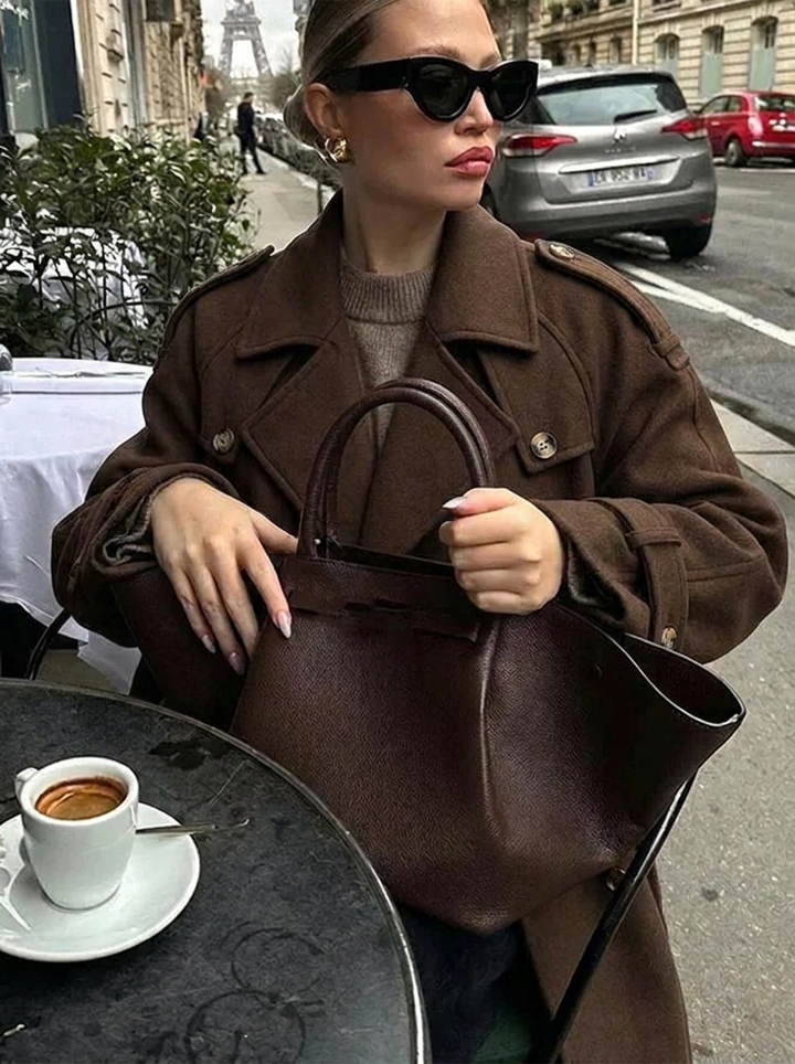 Elegant women's chocolate brown cropped trench coat, classic double-breasted style, ideal fall fashion jacket.