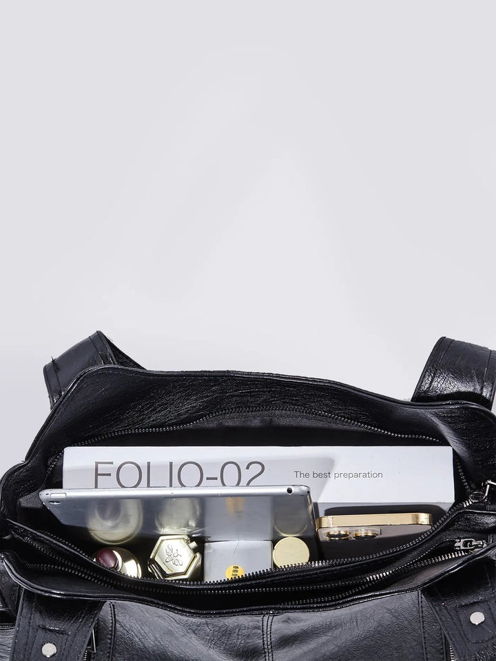 Stylish black leather multi-pocket handbag for women, perfect for work or travel