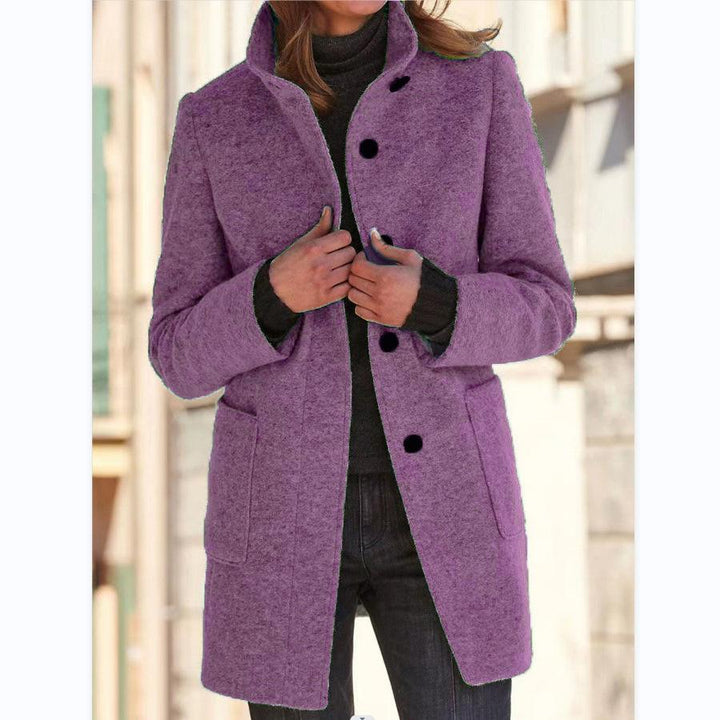 Classic outerwear: women's light grey wool coat with button detail