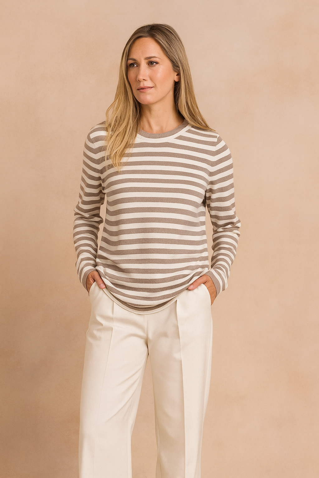 Women's classic striped knit sweater, perfect for cozy casual wear. Elegant long sleeve pullover fashion.