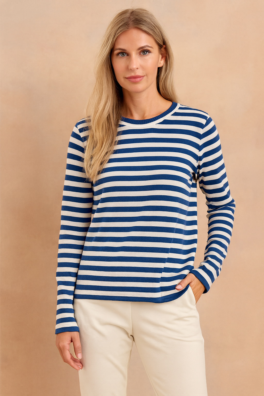 Versatile women's striped knit pullover sweater. Cozy long sleeve design for classic casual style.