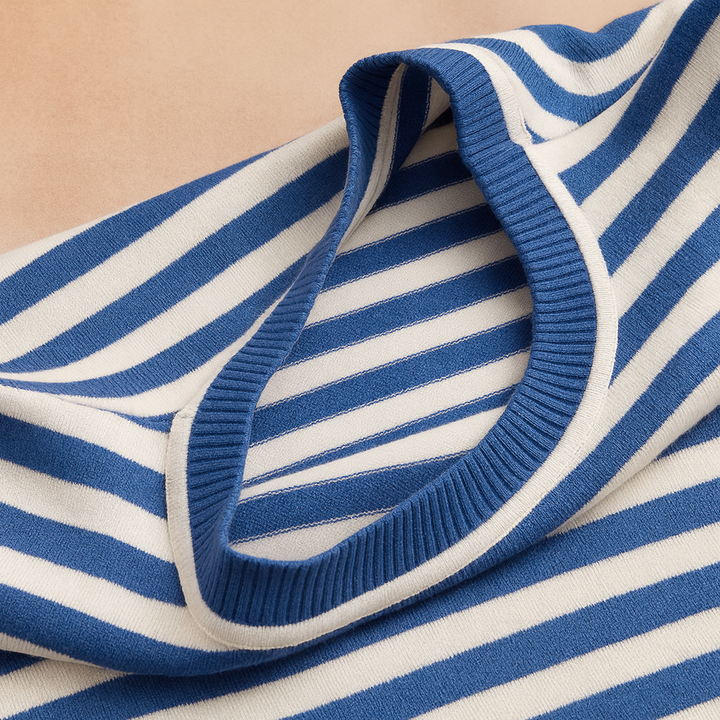 Soft knit women's striped sweater, a cozy long sleeve pullover in classic style. Ideal for versatile casual fashion.