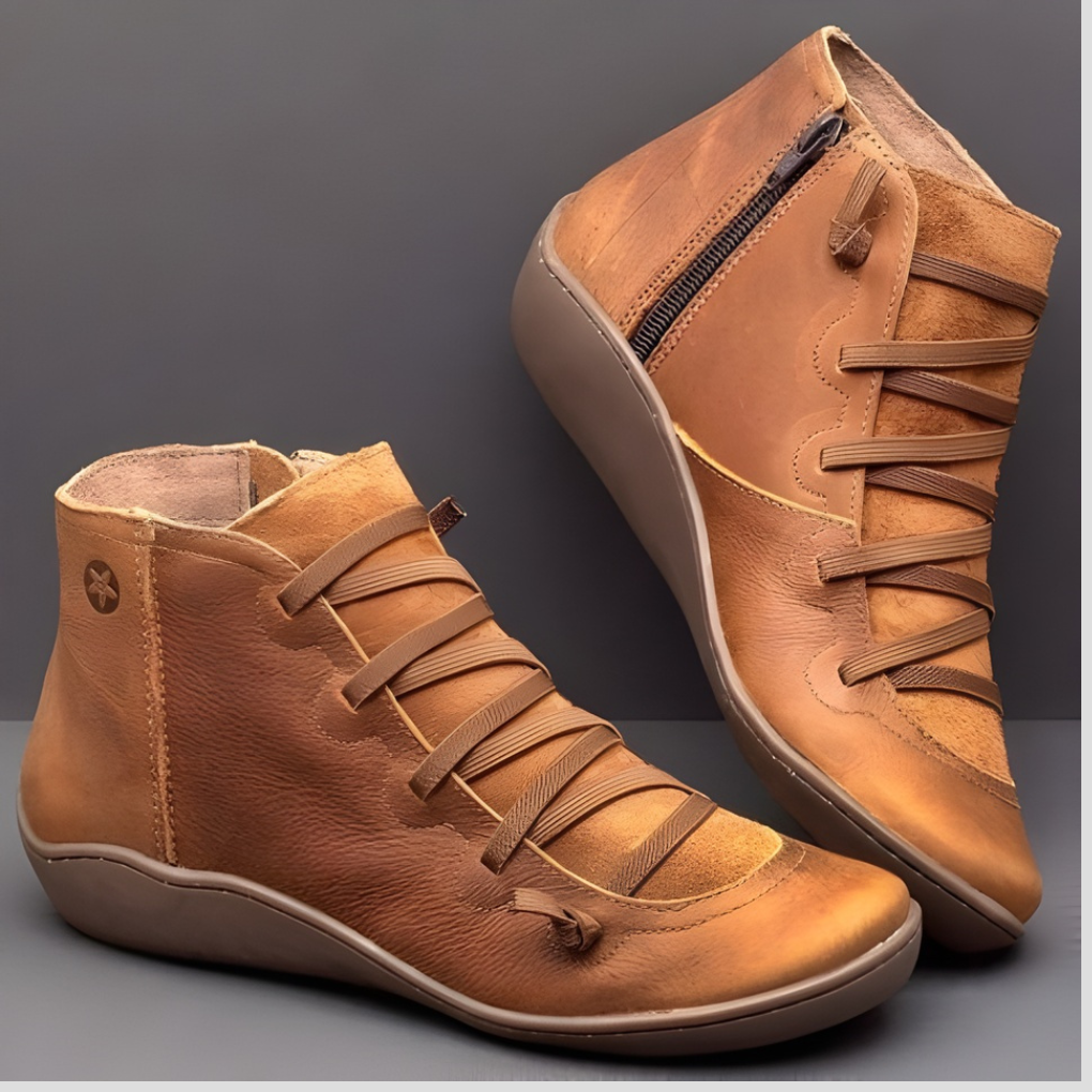 Women's classic style brown leather everyday shoes with adjustable closure.