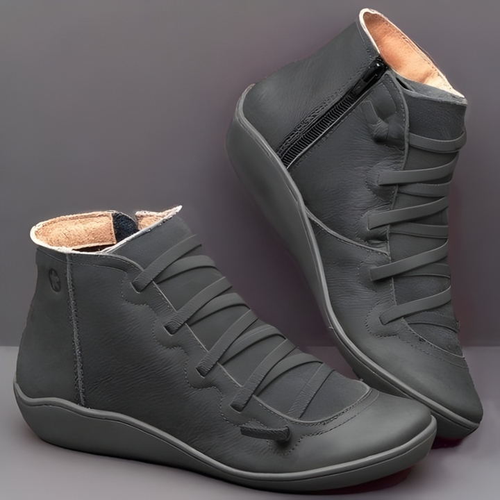 Adjustable closure on women's supportive leather everyday shoes in brown.