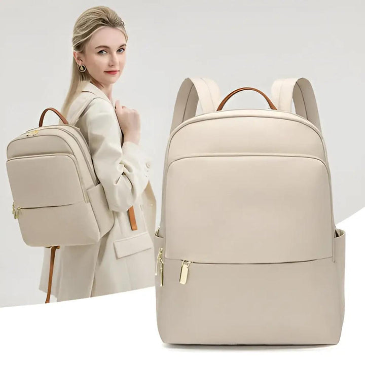 Stylish beige women's waterproof laptop backpack. Perfect for professionals & students needing tech protection.