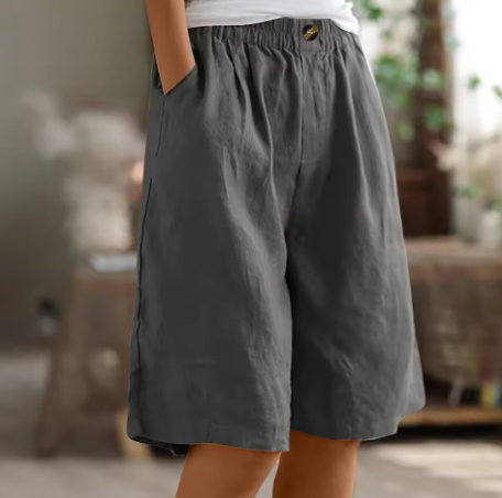 Close-up of soft fabric on women's relaxed fit casual shorts.