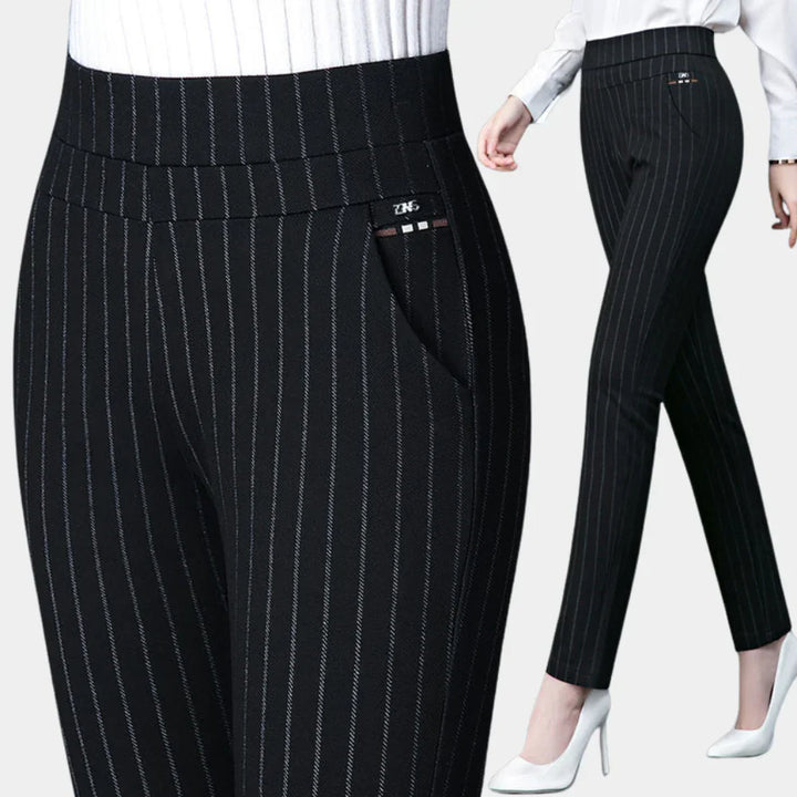Women's comfortable black high-waisted stretch trousers, perfect for casual or office wear, offering all-day comfort.