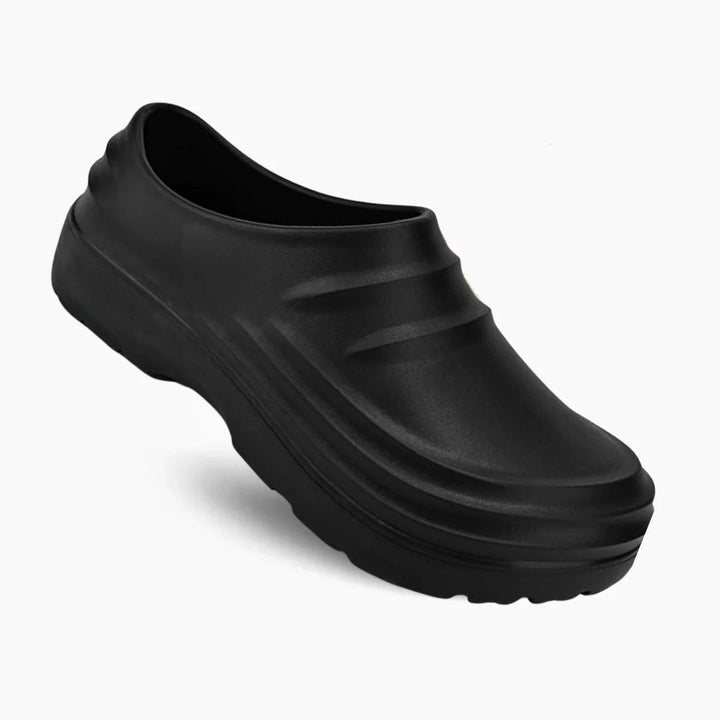 Women's comfortable brown flat sandals with arch support, ideal for everyday casual wear & summer walks.