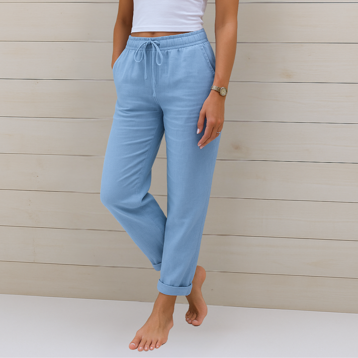 Woman wearing chic women's elastic waist pants, ideal for summer, work, or casual everyday outfits.