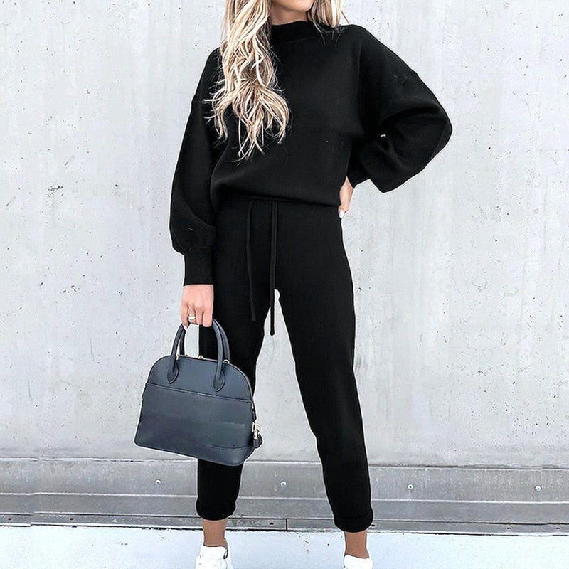 Stylish women's loungewear set with balloon sleeve top & comfy pants, perfect for casual relaxation.