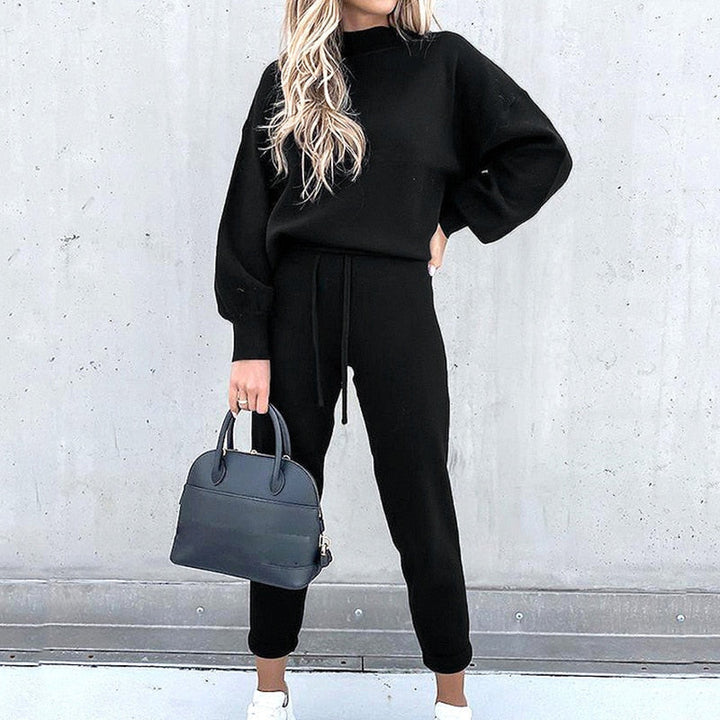 Stylish women's loungewear set with balloon sleeve top & comfy pants, perfect for casual relaxation.