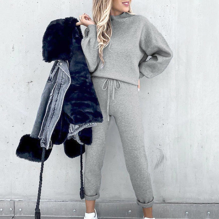 Soft, cozy women's two-piece loungewear set featuring a trendy balloon sleeve top and comfortable pants.
