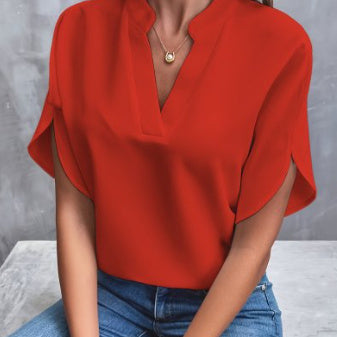 Stylish women's summer blouse, featuring short sleeves for a comfortable fit.