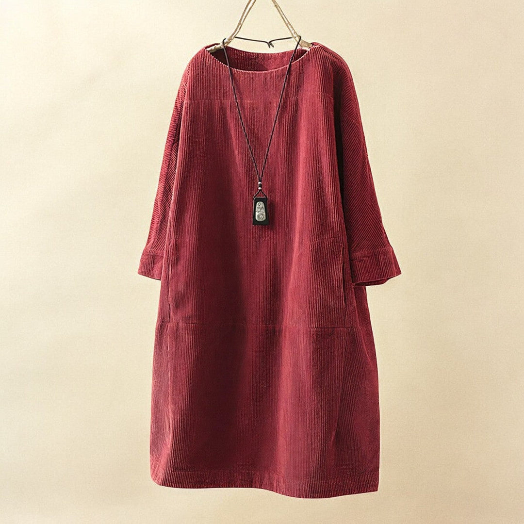 Versatile women's dress offering comfort and a slimming tummy effect.