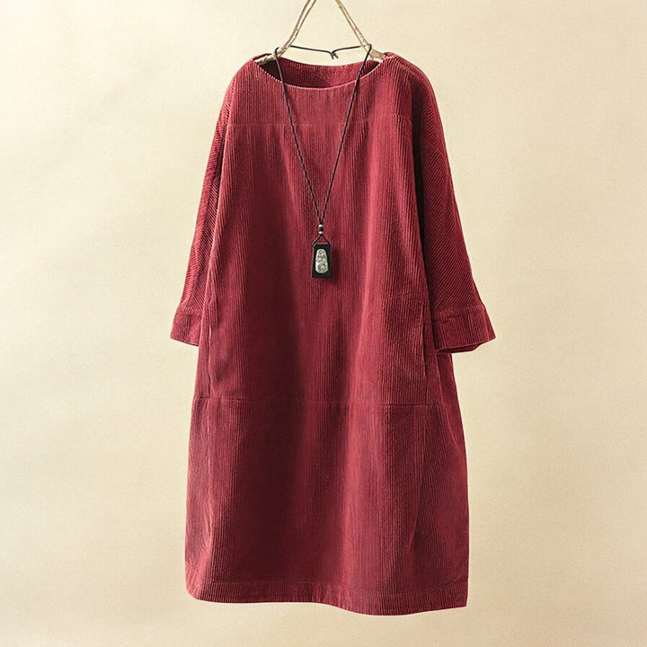 Versatile women's dress offering comfort and a slimming tummy effect.