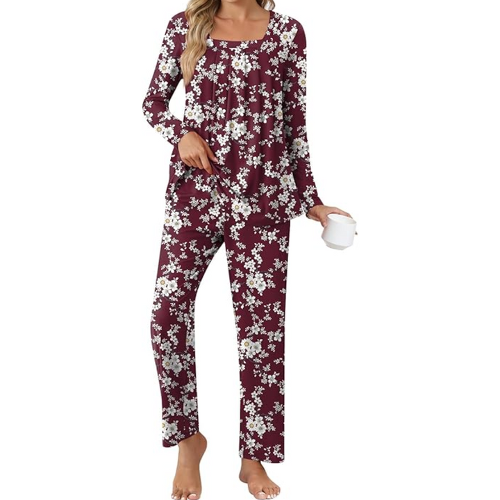 Soft fabric women's two-piece sleepwear with long sleeves & practical pockets.