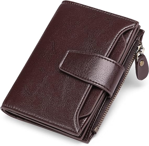 Close-up of high-quality pebbled leather on a women's compact RFID blocking wallet with fine stitching details.