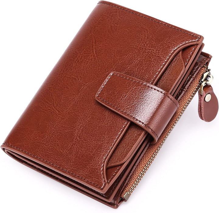 Practical women's compact RFID blocking leather wallet; a secure organizer for cards, cash, and coins.