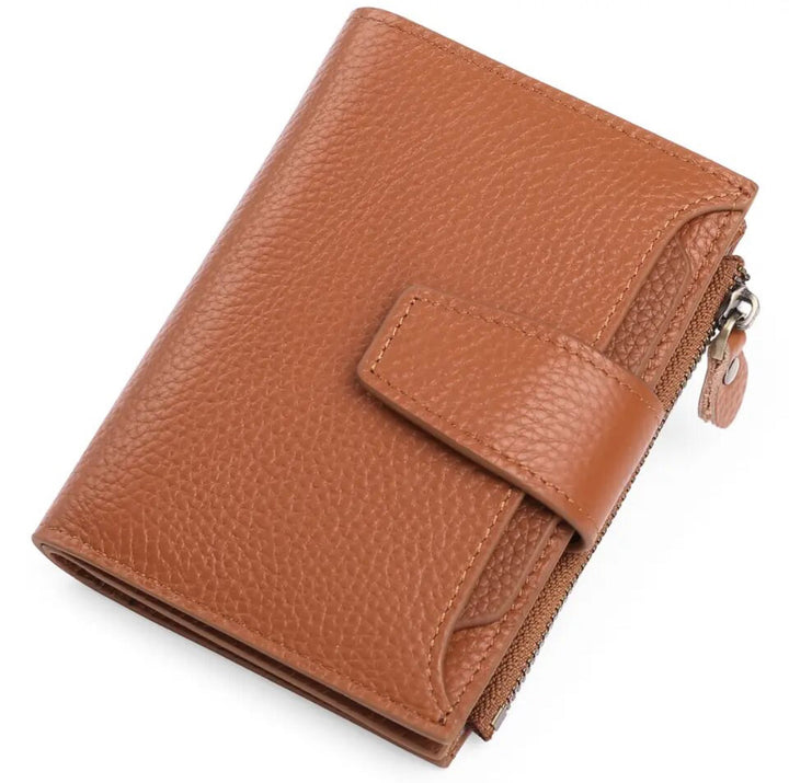 Women's compact leather wallet with numerous card slots, RFID blocking security, and an easy-access coin pocket.