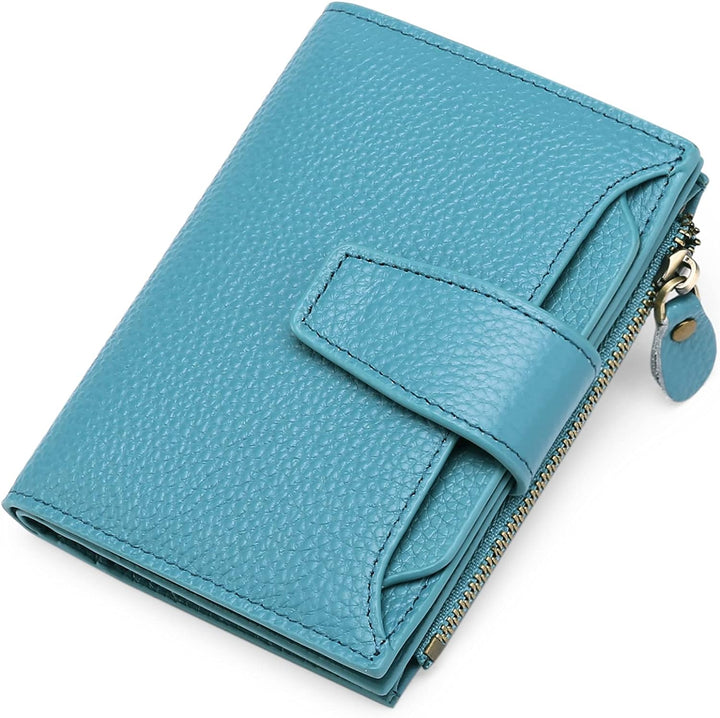 Ultra-slim women's RFID blocking leather wallet, fits easily in small bags, holds cards & cash securely.