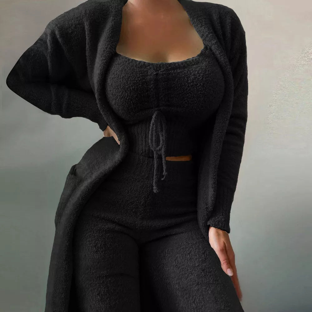 Women's cozy 3-piece knit lounge set for ultimate comfort and style. Includes cardigan, cami, and pants.