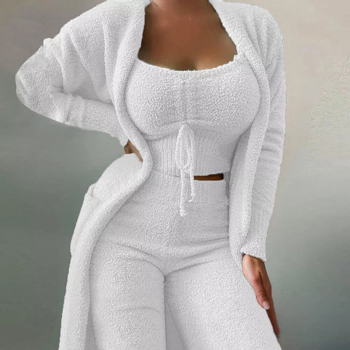 Cozy women's three-piece loungewear set. Soft knit fabric, perfect for relaxing at home in comfort and style.