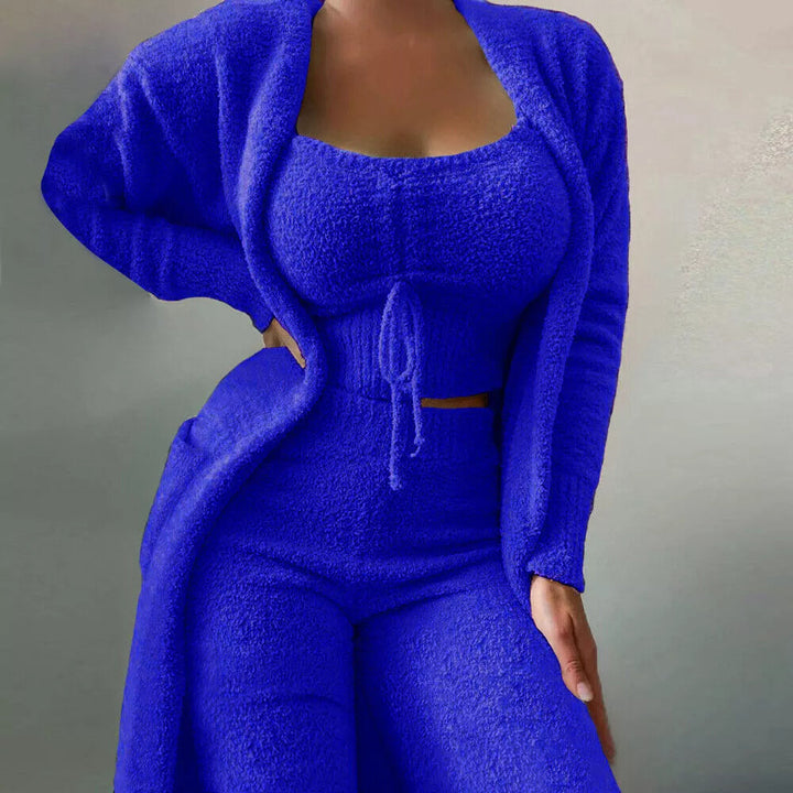 Stylish & cozy women's 3-piece knit lounge set. Includes cardigan, cami, & pants for ultimate home comfort & relaxation.