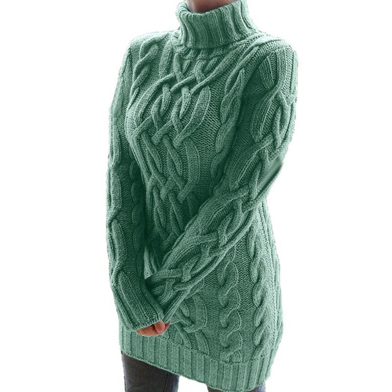 Women's cozy cable-knit turtleneck sweater dress with long sleeves.