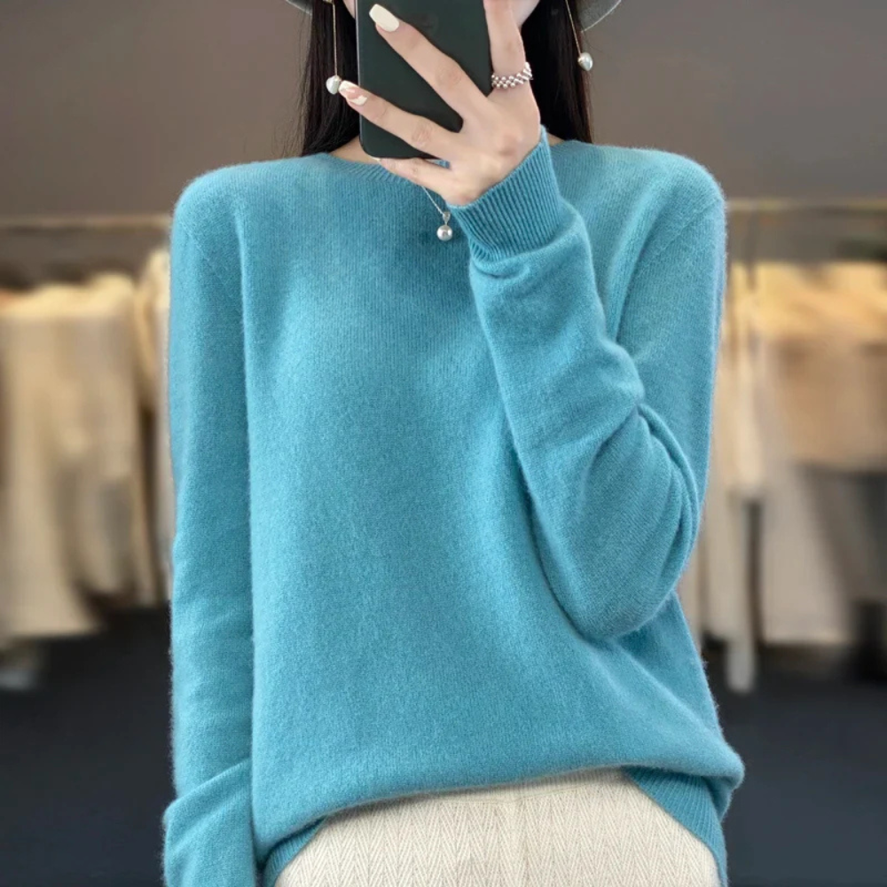 Women's cozy crewneck pullover sweater for ultimate warmth & comfort. Ideal for fall/winter casual wear.