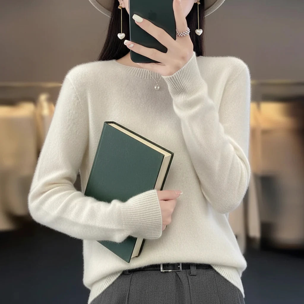 Comfortable women's pullover crewneck sweater. Soft, warm long sleeve knit for cozy everyday wear.