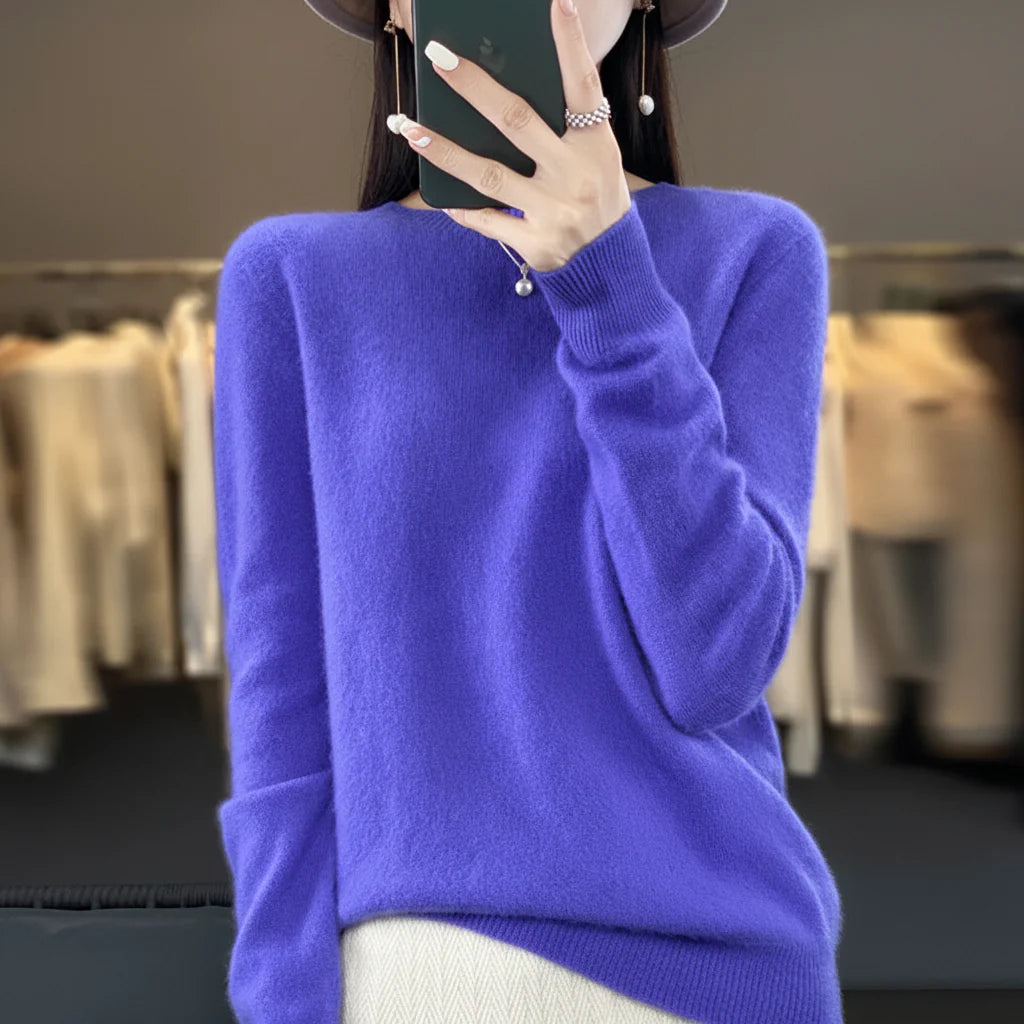 Casual cozy women's crewneck pullover sweater. Soft warm knit long sleeve top for everyday comfort.