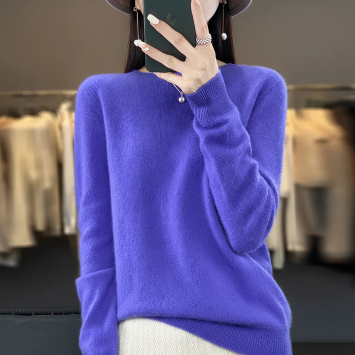 Casual cozy women's crewneck pullover sweater. Soft warm knit long sleeve top for everyday comfort.