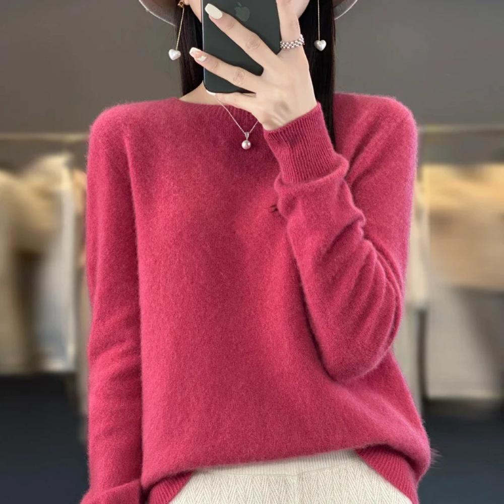 Women's cozy crewneck pullover sweater. Soft warm knit, ideal for everyday warmth and style.