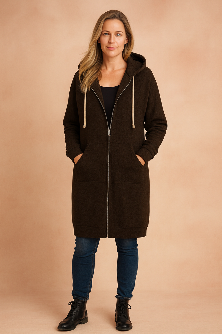 Flattering women's cozy long sweater. Versatile for casual & elegant looks.