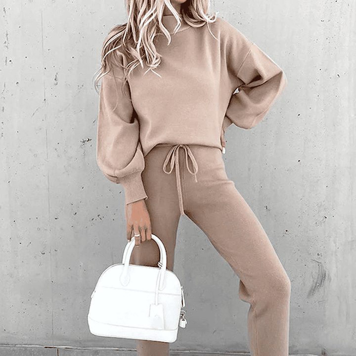Complete women's loungewear set: cozy turtleneck and comfortable high-waist pants for ultimate relaxation.