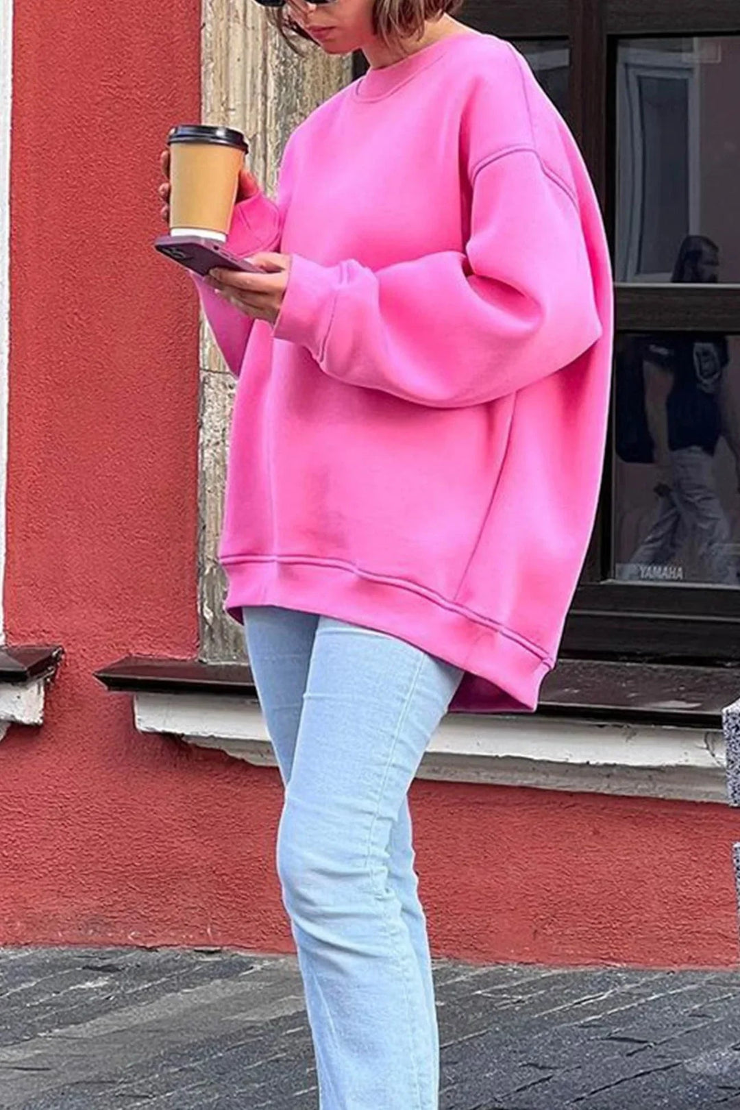 Women's cozy oversized round neck sweatshirt, perfect for comfortable everyday casual wear.