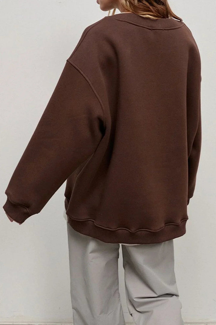 Ultimate comfort: women's oversized round neck sweatshirt. A cozy, loose-fit pullover for everyday style.